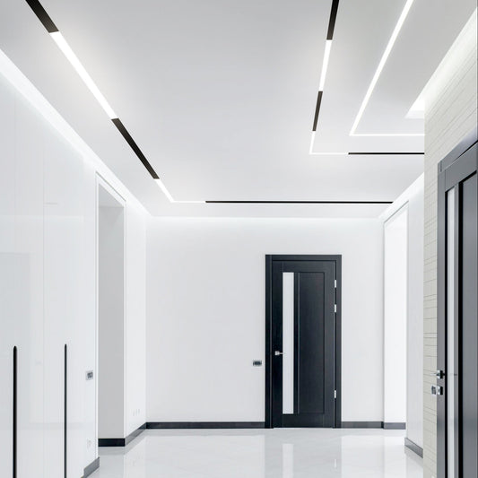 Recessed magnetic track lighting system integrated into a modern corridor ceiling – Easy Light architectural lighting solution.