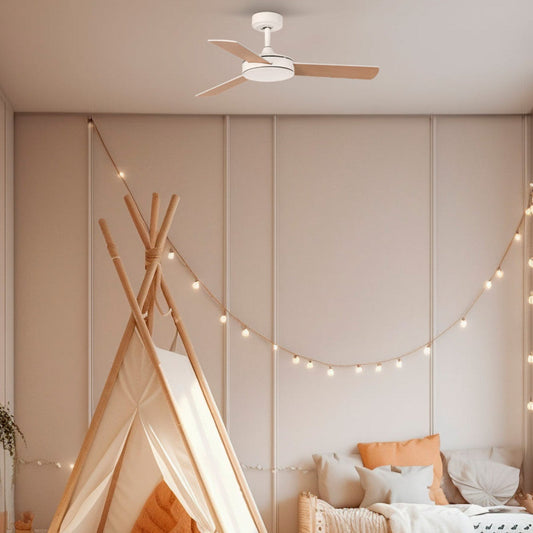 Children's bedroom with a teepee, bed, and string lights.