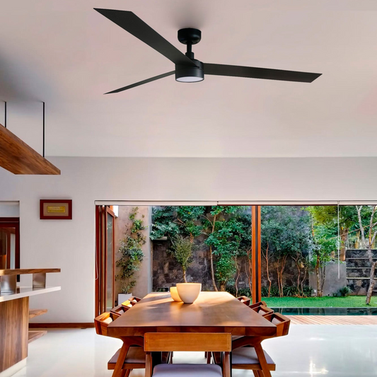 Modern dining room with wooden table and chairs, ceiling fan, and large windows.