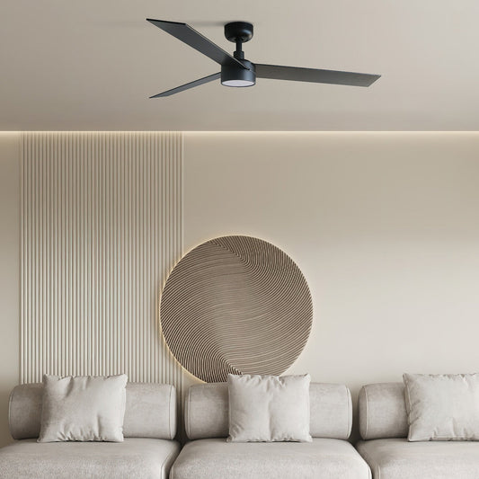 Modern living room with a ceiling fan, sectional sofa, and round coffee table.