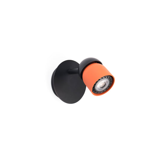 Black and orange wall light fixture on a white background