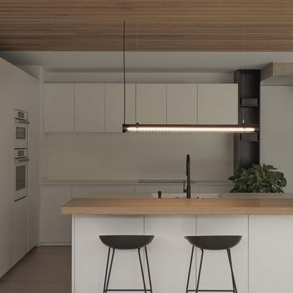 Modern kitchen with wooden island and pendant lights