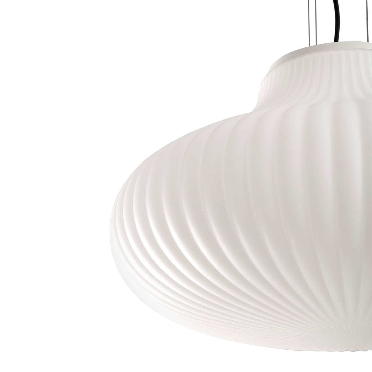 White pendant light with a textured shade on a white background