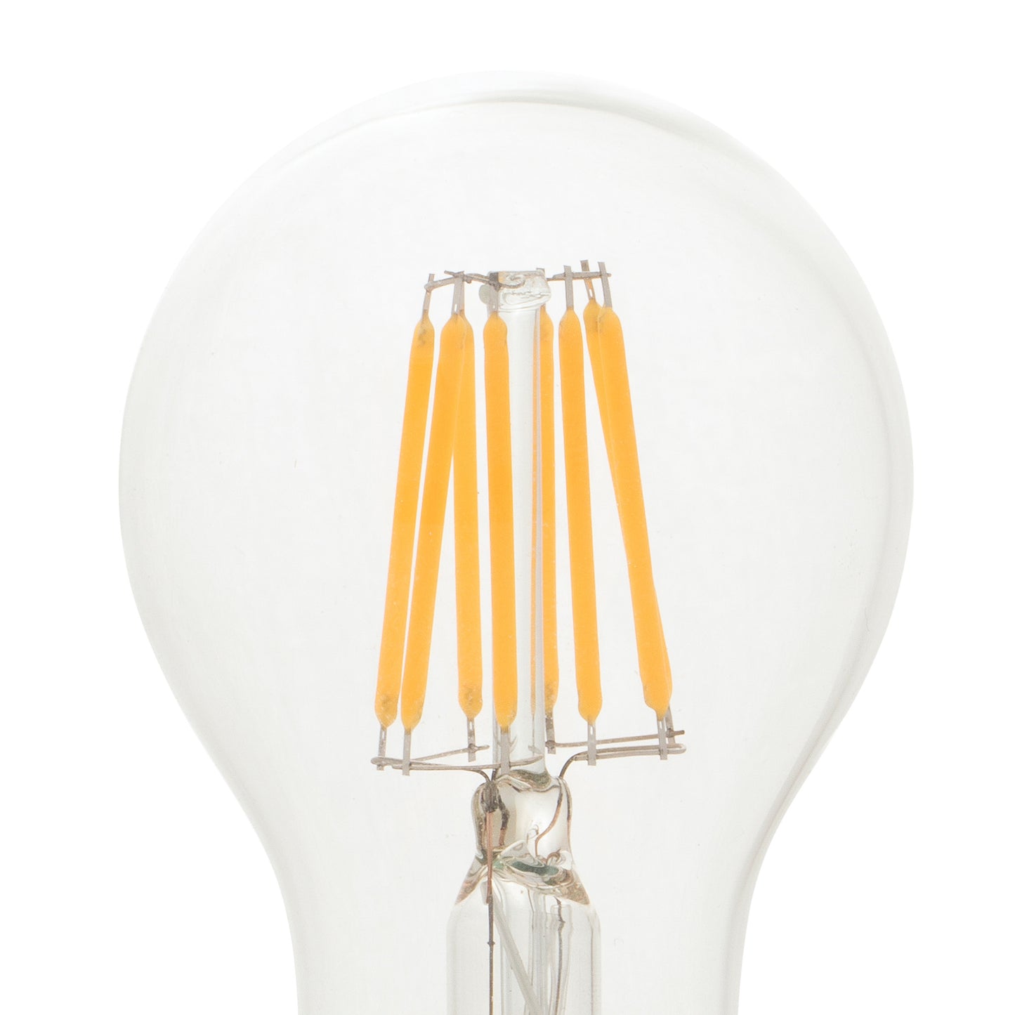 Clear light bulb with yellow filaments on a white background