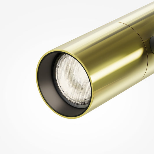 Gold cylindrical light fixture on a white background