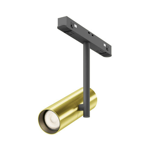 Gold cylindrical light fixture on a white background