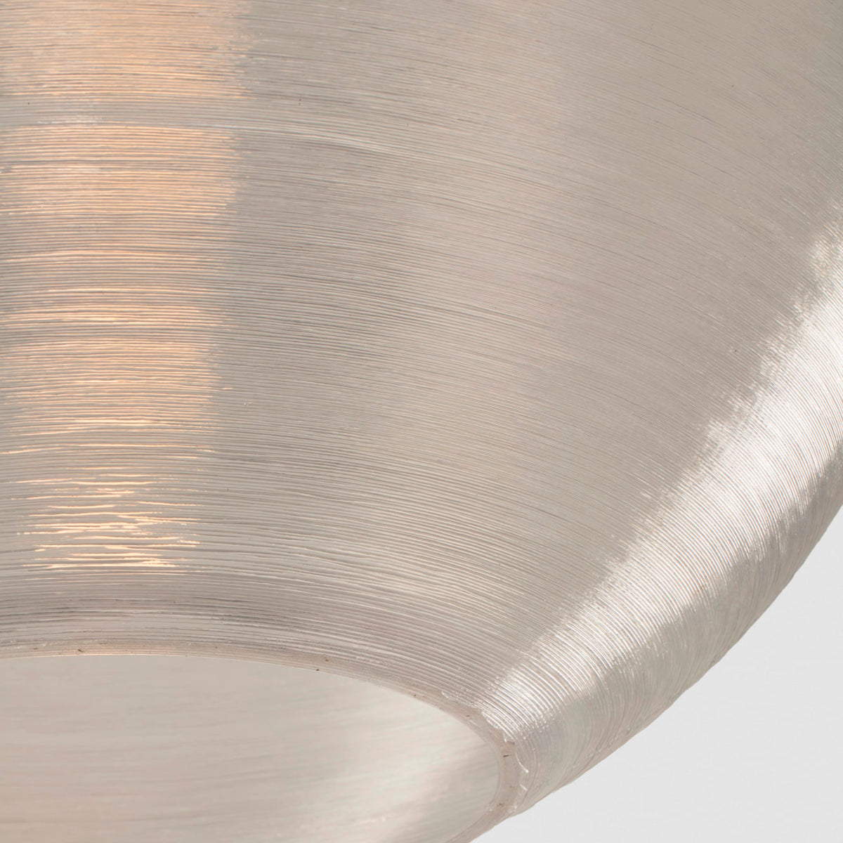 A close-up view of the AIRE 850 pendant light by Faro Barcelona, highlighting the unique layered 3D-printed texture of the recycled PETG shade. Available to buy at the VXR Space store.