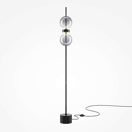 Modern floor lamp with spherical design on a white background