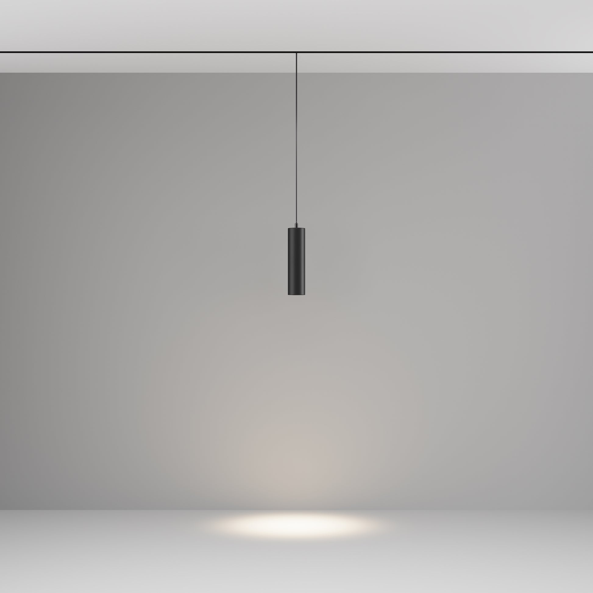 Minimalist pendant light fixture on a plain background