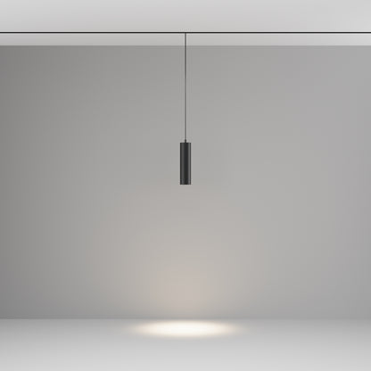 Minimalist pendant light fixture on a plain background