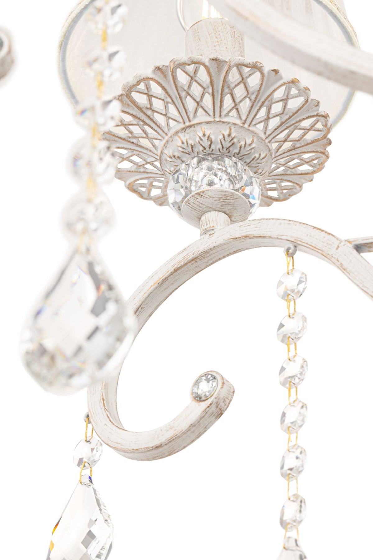 Close-up of a decorative chandelier with intricate design and crystal elements.