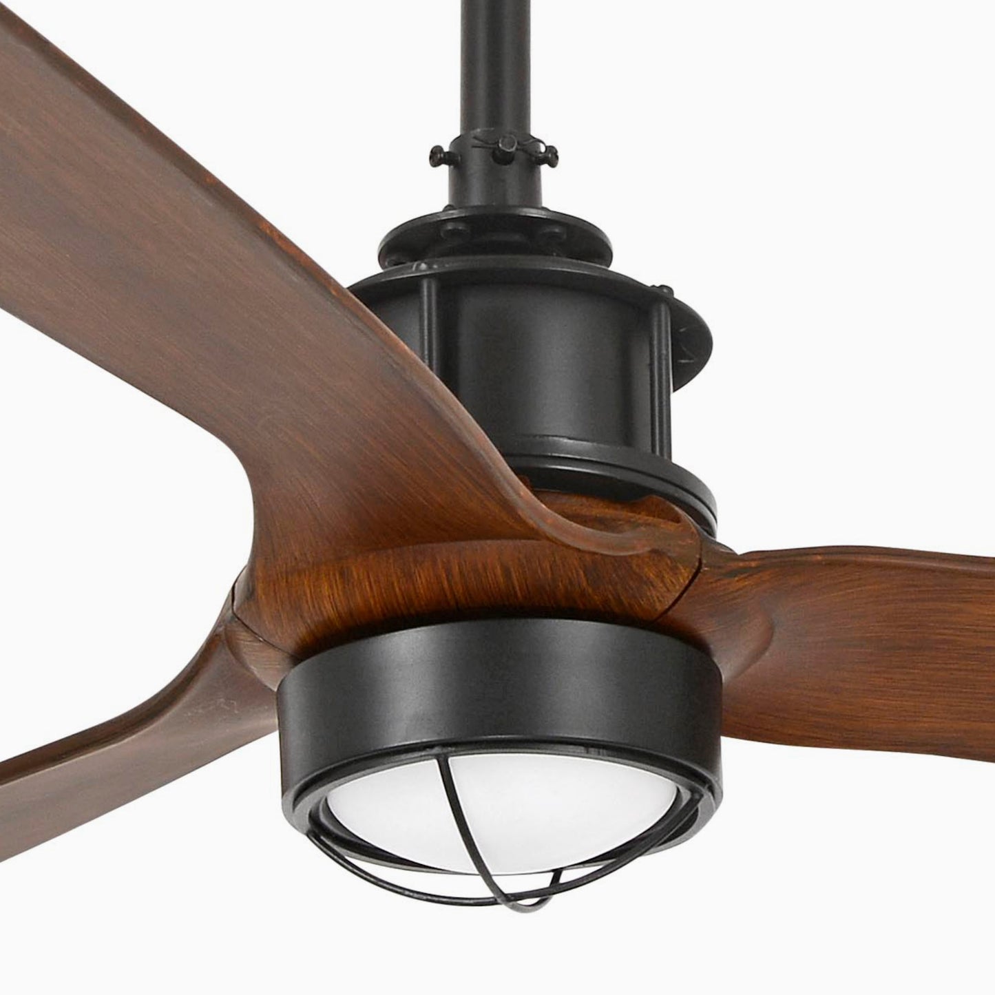 Ceiling fan with wooden blades and black light fixture on a white background