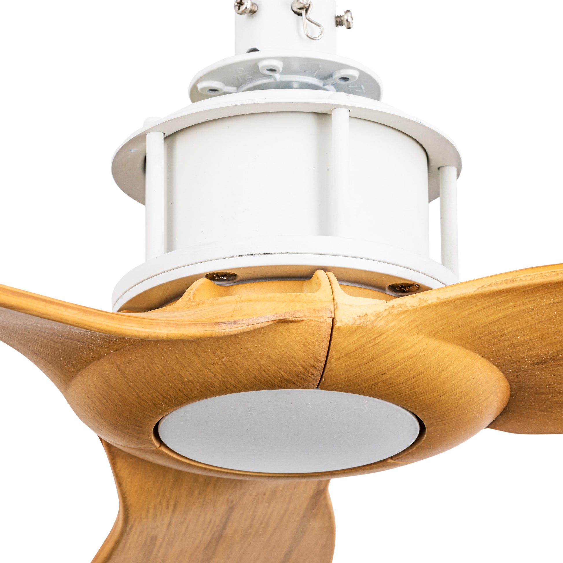 Ceiling fan with wooden blades and white motor housing on a white background