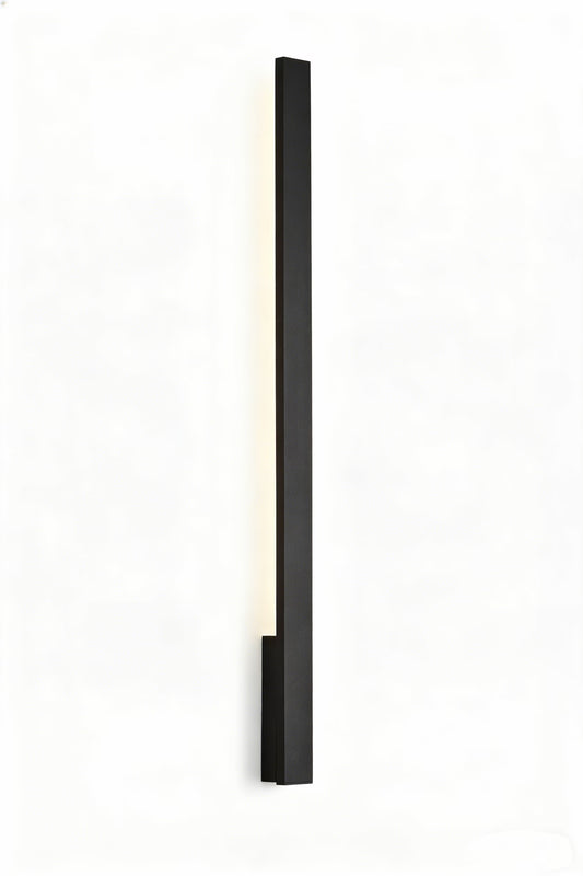 Studio view of the Kaprun black modern LED outdoor wall light showing its slim linear profile and integrated illumination against a white background. Available to buy at the VXR Space store.