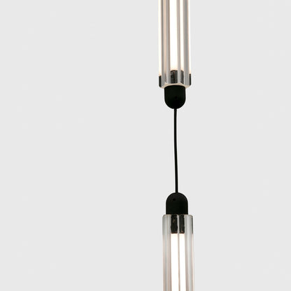 Modern pendant light with clear cylindrical design on a white background