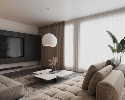 Wide-angle view of a modern Nordic living room featuring the MAXLight Pierre 48cm white organic pendant light, a modular beige sofa, and a marble coffee table. Available to buy at the VXR Space store.