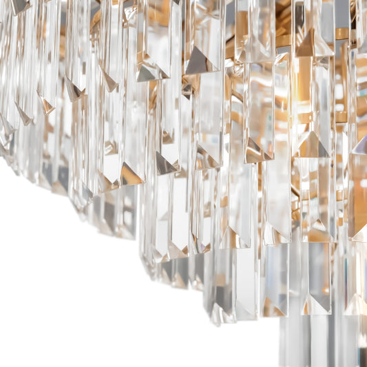 Close-up of a chandelier with crystal-like design on a white background