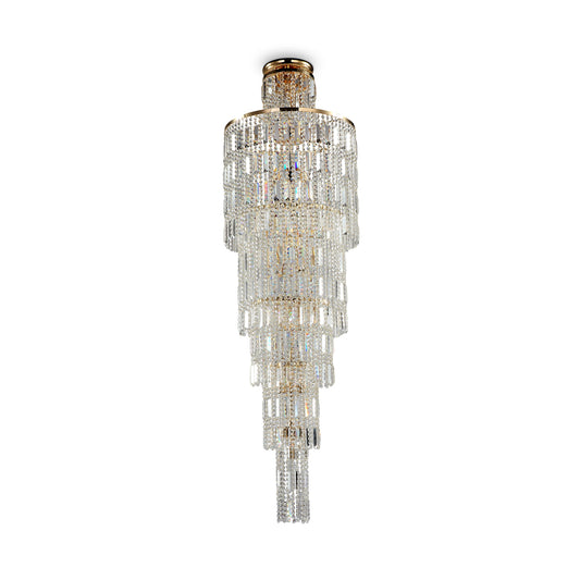 A grand 16-light Niagara cascading crystal chandelier by Maytoni. The towering, multi-layered structure is densely packed with light-refracting crystals set against a solid gold-finished base, showcasing its imposing vertical presence.
