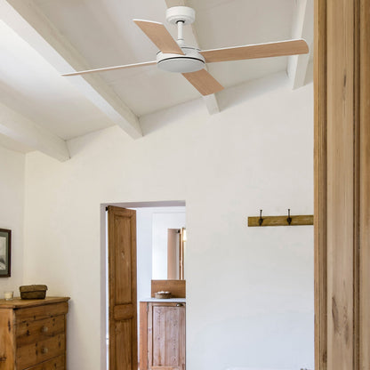 Bedroom with wooden dresser, bed, and ceiling fan.