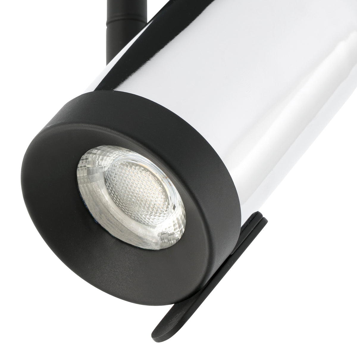 Close-up of a black and white spotlight on a white background