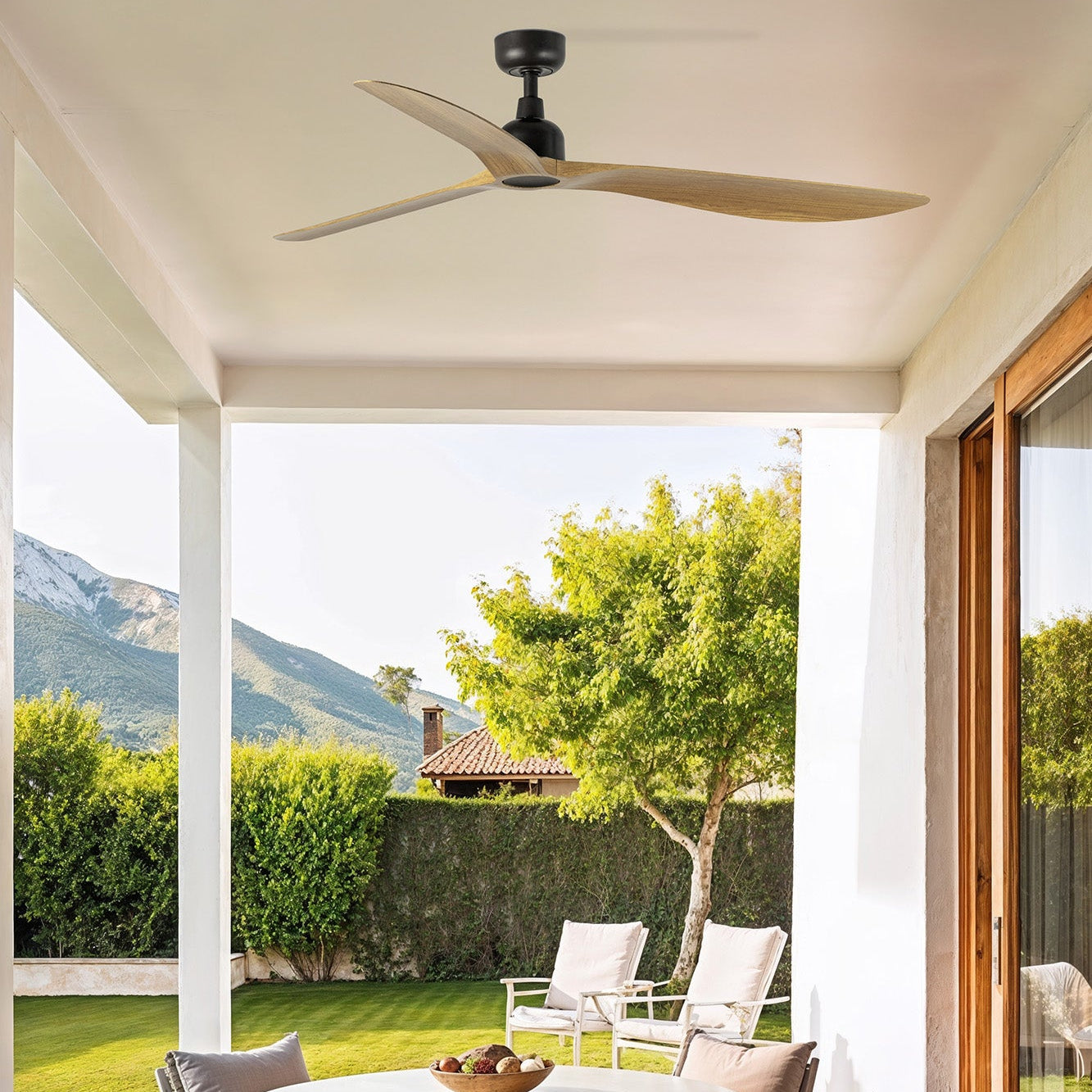 Outdoor patio with round table and ceiling fan IP 44