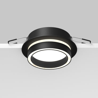 Modern ceiling light fixture with black and white design on a gray background