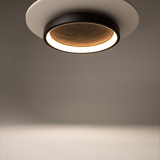 Modern ceiling light fixture on a neutral background