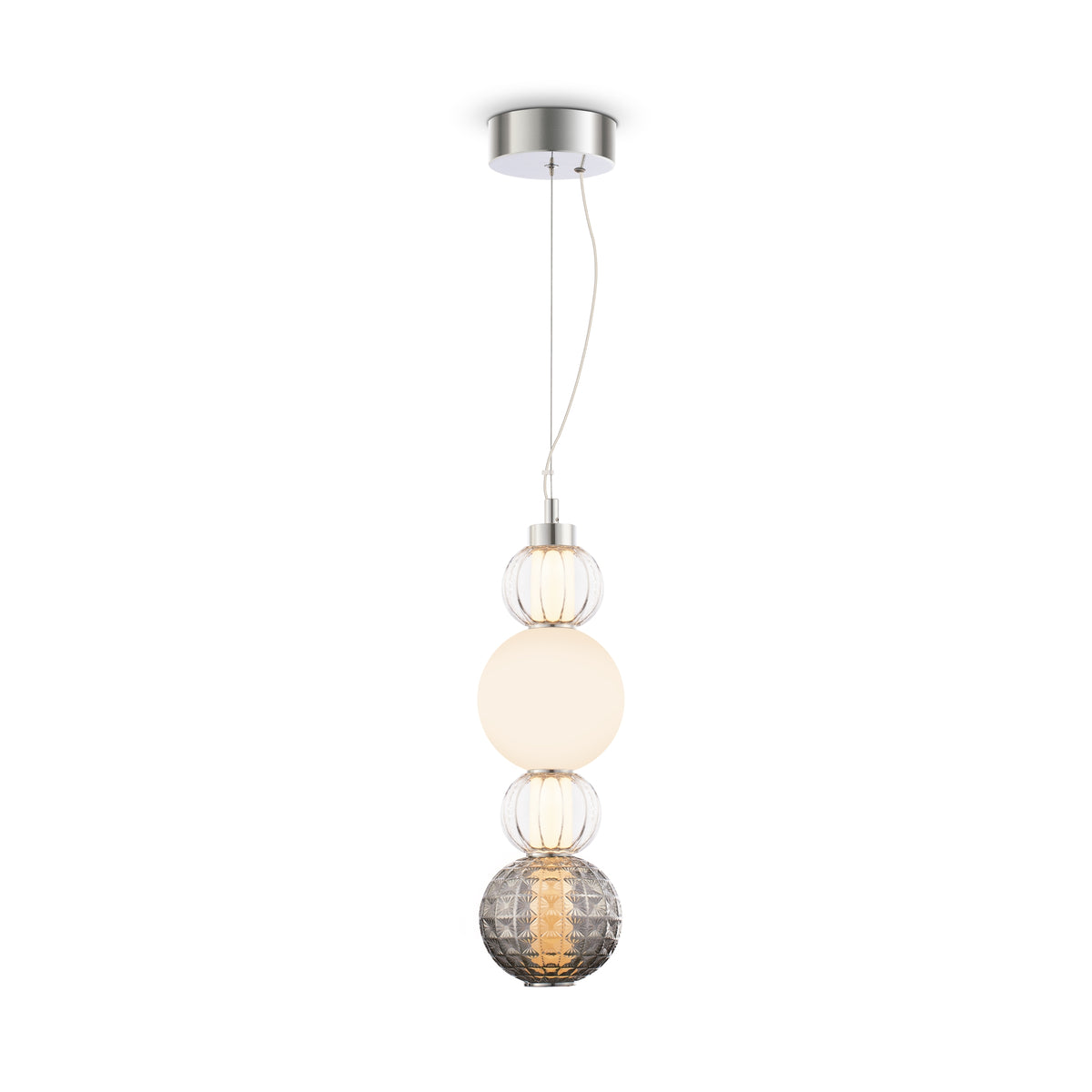 Modern pendant light with three glass shades on a white background