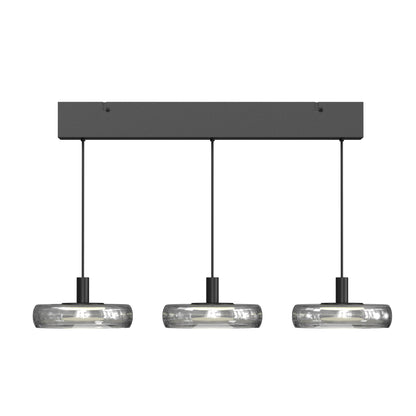 Modern pendant light with three glass shades on a white background