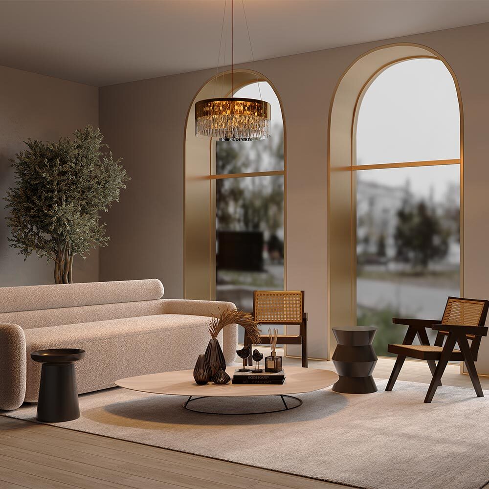 Modern living room with beige sofa, round coffee table, and decorative elements.