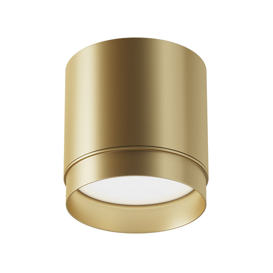 Gold cylindrical light fixture on a white background