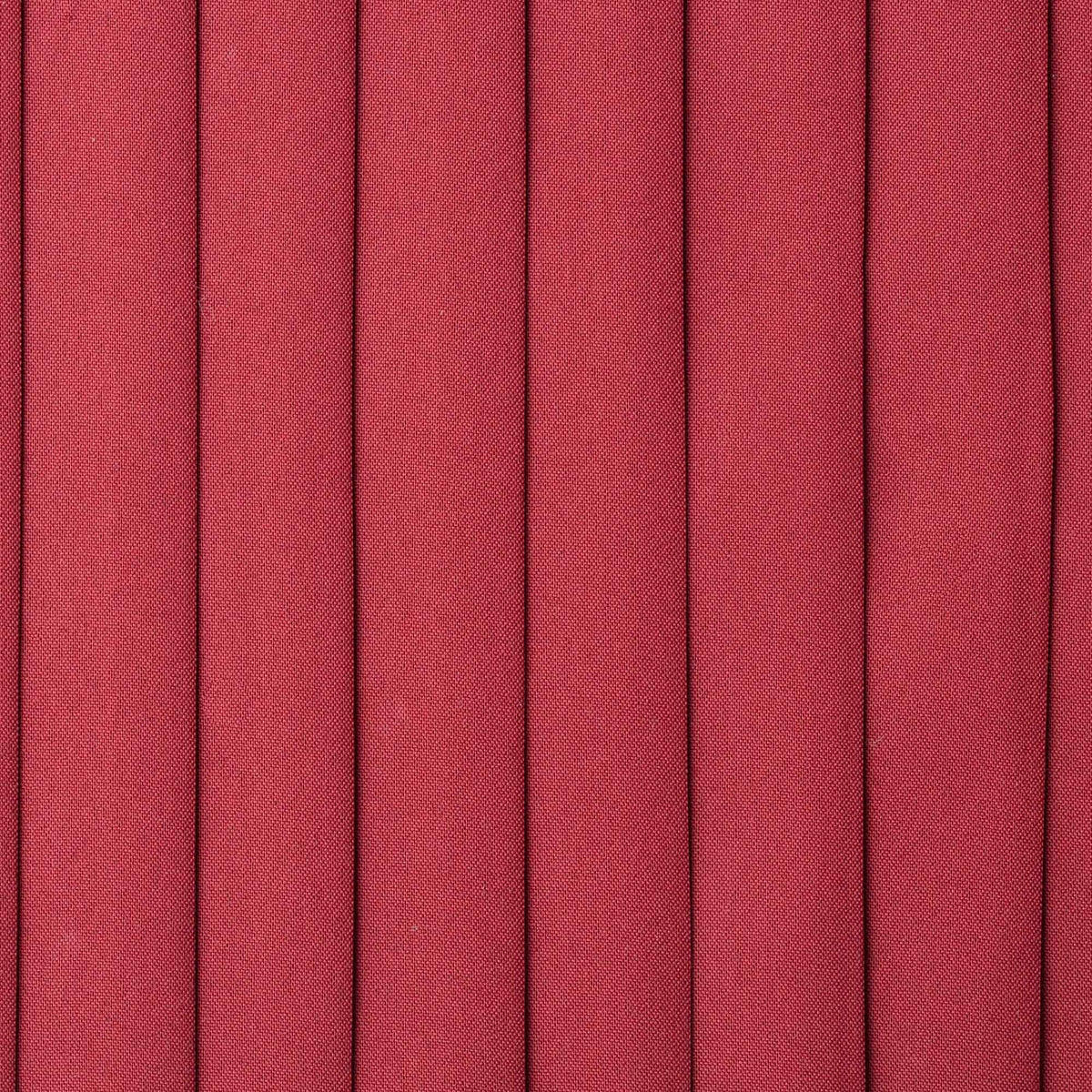 Close-up of red pleated fabric texture