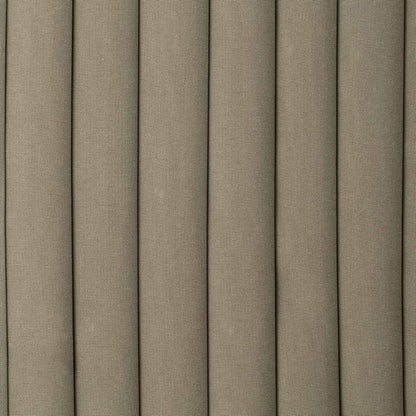 Close-up of pleated fabric with a neutral color