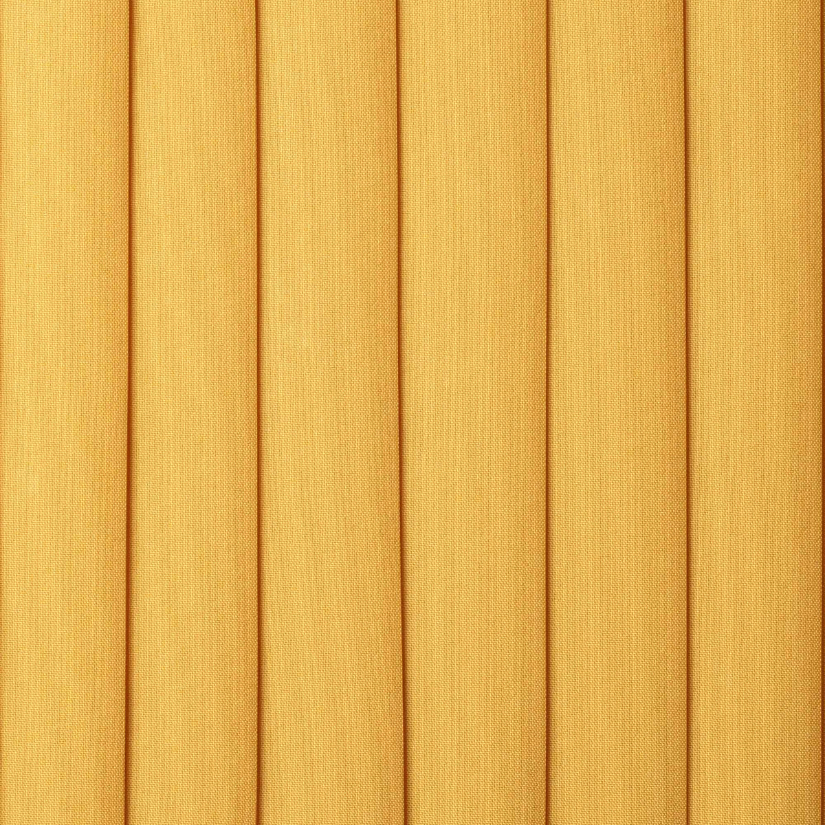Close-up of a textured yellow fabric with horizontal lines