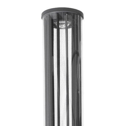 A close-up of a modern outdoor light fixture with a cylindrical black frame, vertical clear glass panels, and a black top cap, shown against a plain white background.