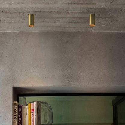 Satin gold ceiling lamp made of aluminum. STAN is a series of indoor luminaires.