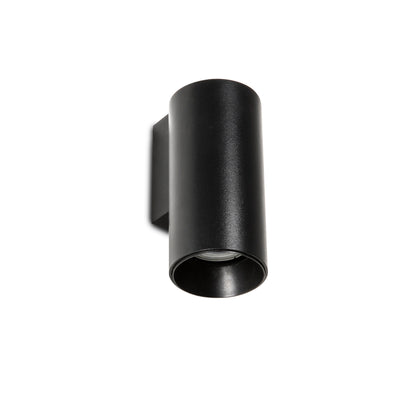 A modern matte black cylindrical wall sconce light fixture shown from an angled perspective against a solid white background.