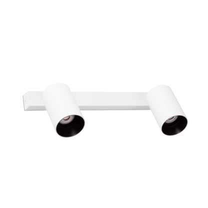 A modern two-light linear wall sconce in white, featuring cylindrical heads with black interior trim, shown against a plain white background.