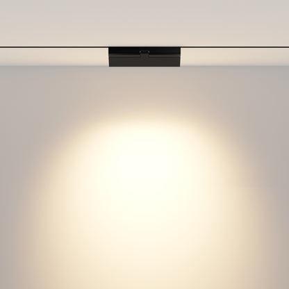 Adjustable black Points rotatable magnetic track lighting module showing rotation capability