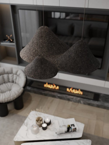 Bellmond 3-light organic textured cluster pendant light hanging above a coffee table in a modern living room