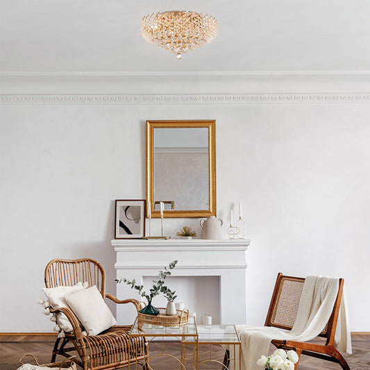 Living room with wicker chairs, a coffee table, and decorative items.