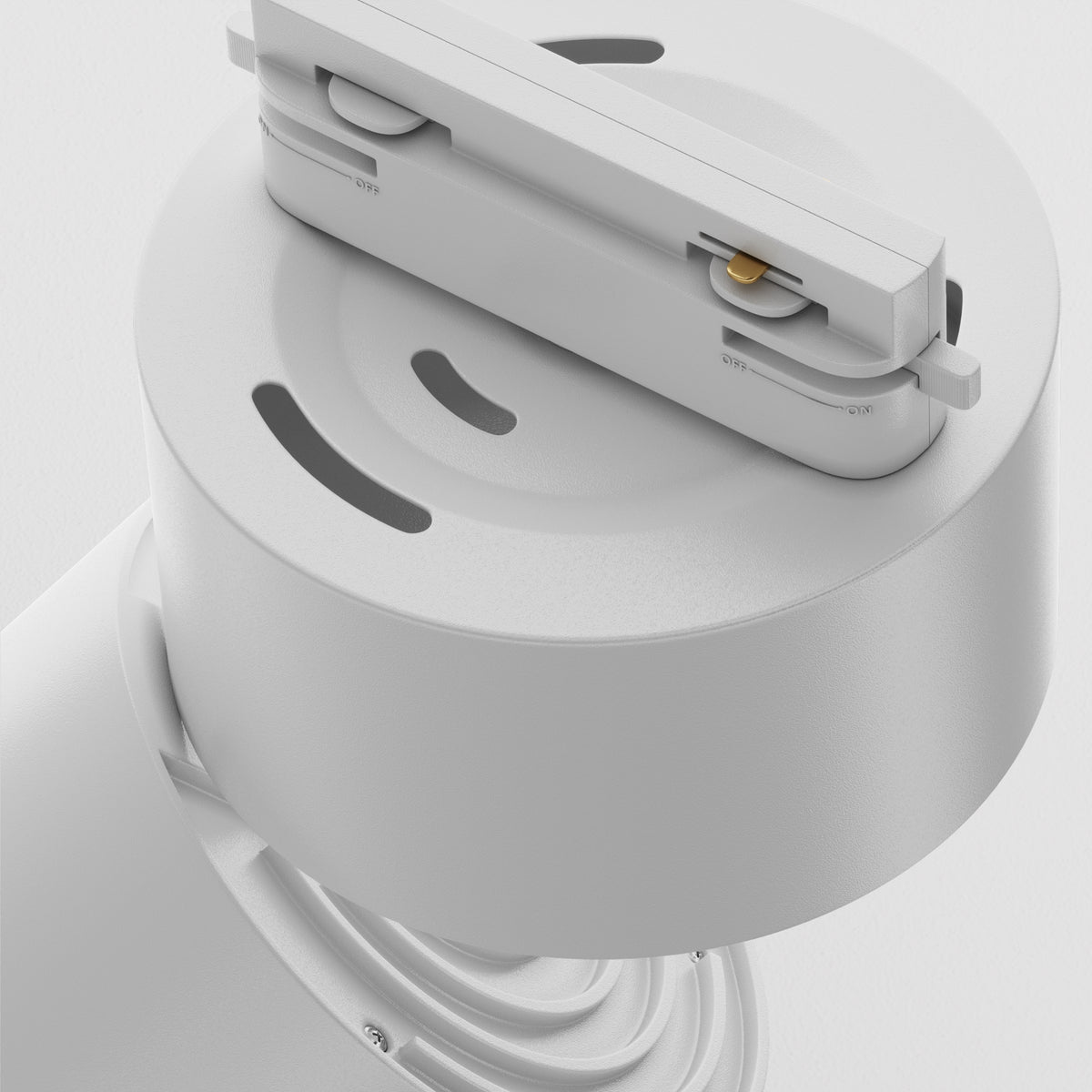 White electronic device with a cylindrical base on a light gray background
