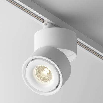 White ceiling track light fixture on a neutral background