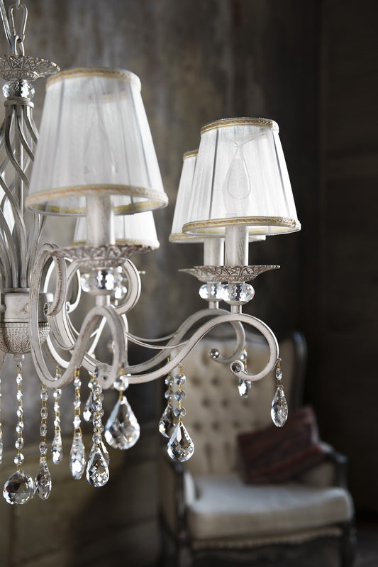 Decorative chandelier with crystal elements in a room setting