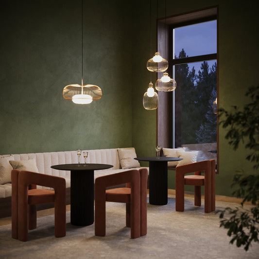 Modern interior with brown chairs, black tables, and decorative lighting fixtures.