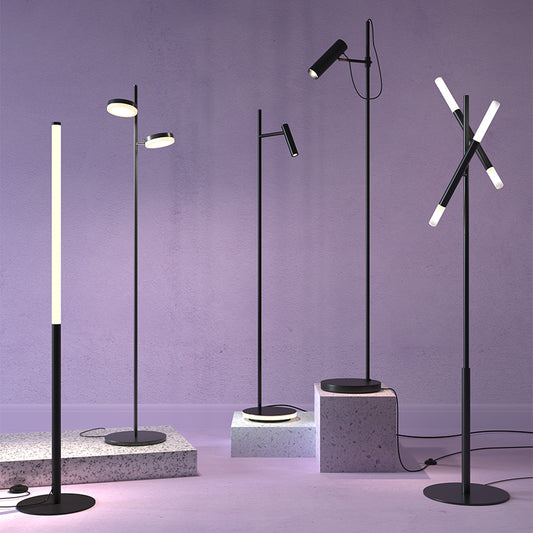 Modern floor lamps with different design styles on a purple background