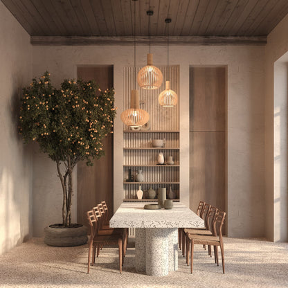 Dining area with a table, chairs, and shelves in a modern interior setting.