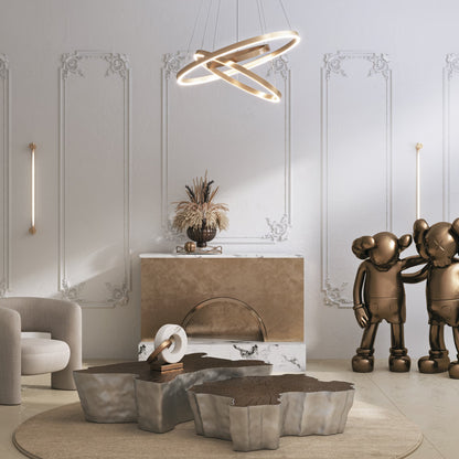 Modern interior with decorative elements including a pendant light, sculpture, and abstract art.