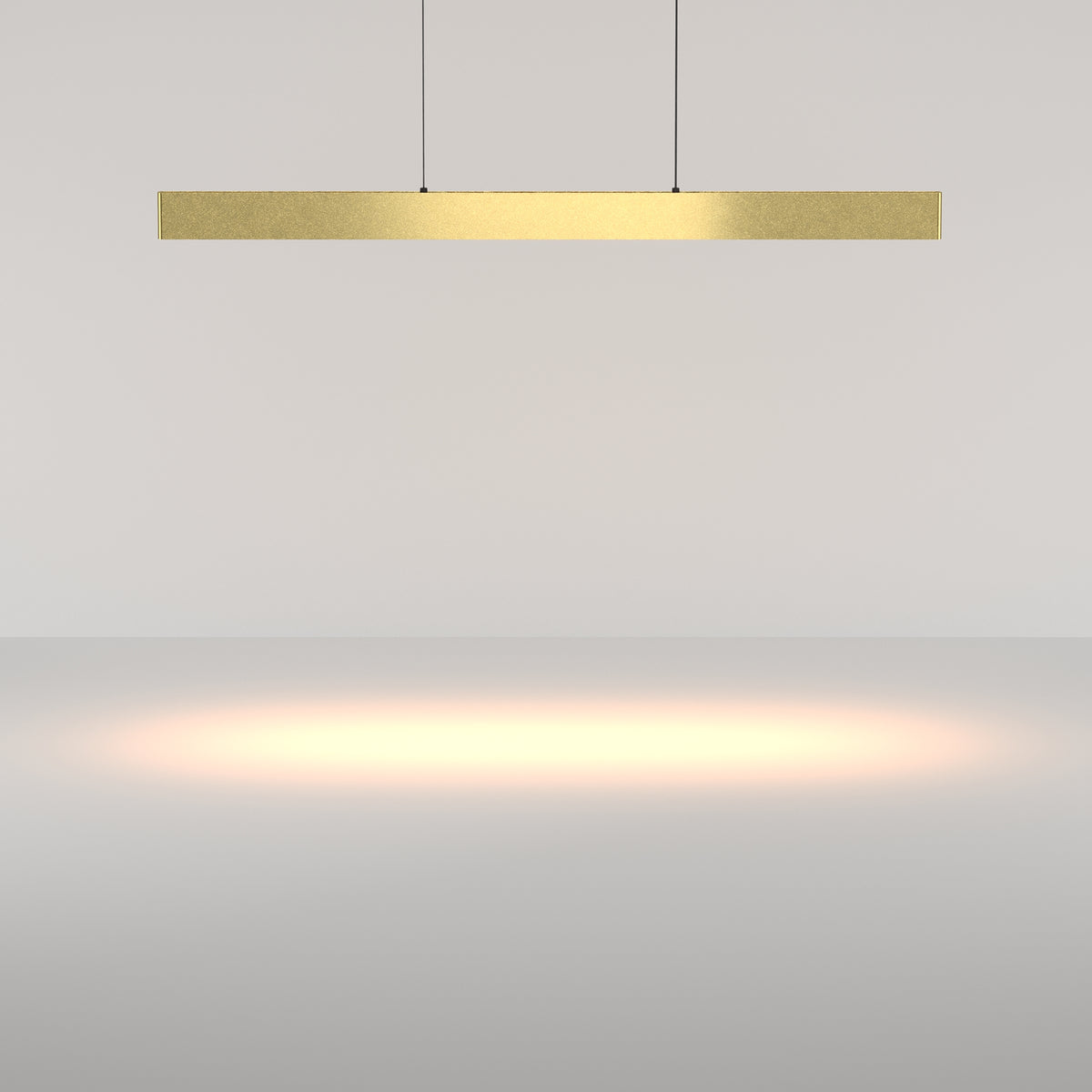 Gold pendant light fixture on a plain background