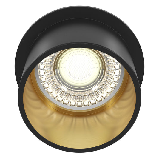 Black and gold recessed ceiling light on a white background